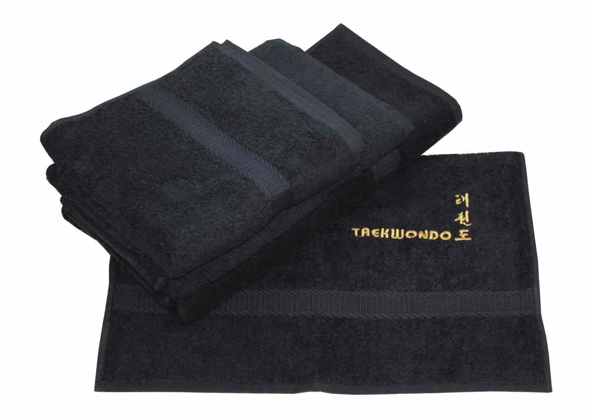 Towels embroidered in black and gold with Taekwondo and characters
