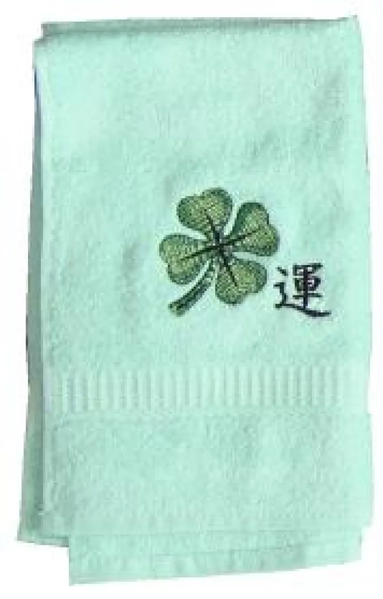Shower and hand towels with "cloverleaf" motif