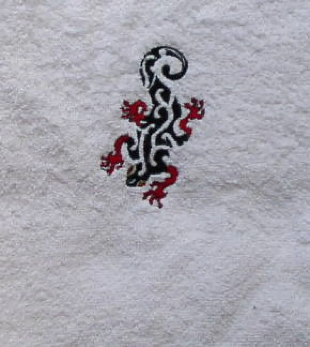 Shower and hand towels with "Gecko" motif