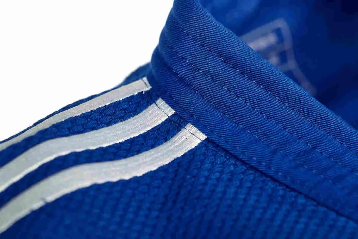 adidas Judojacke CHAMPION III IJF blau/weiß, slim